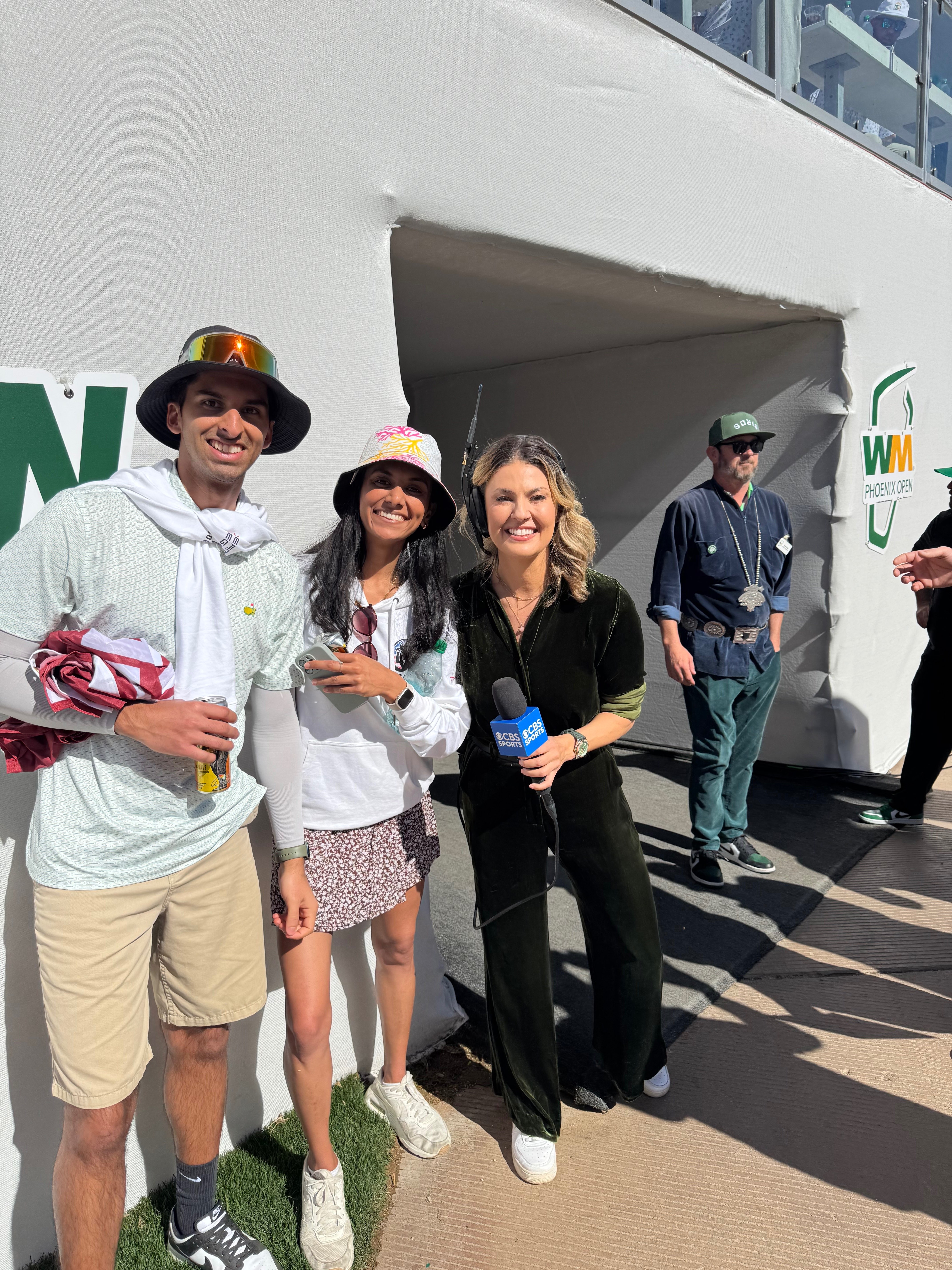 Golf community members at professional tournament event